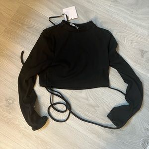 Never been worn super down long sleeve with wrap around waist